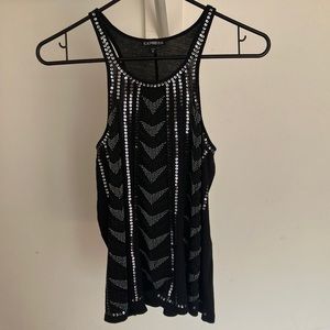 Cute shirt sleeveless. Looks bigger than it is, Im 5.4 and fits me perfectly